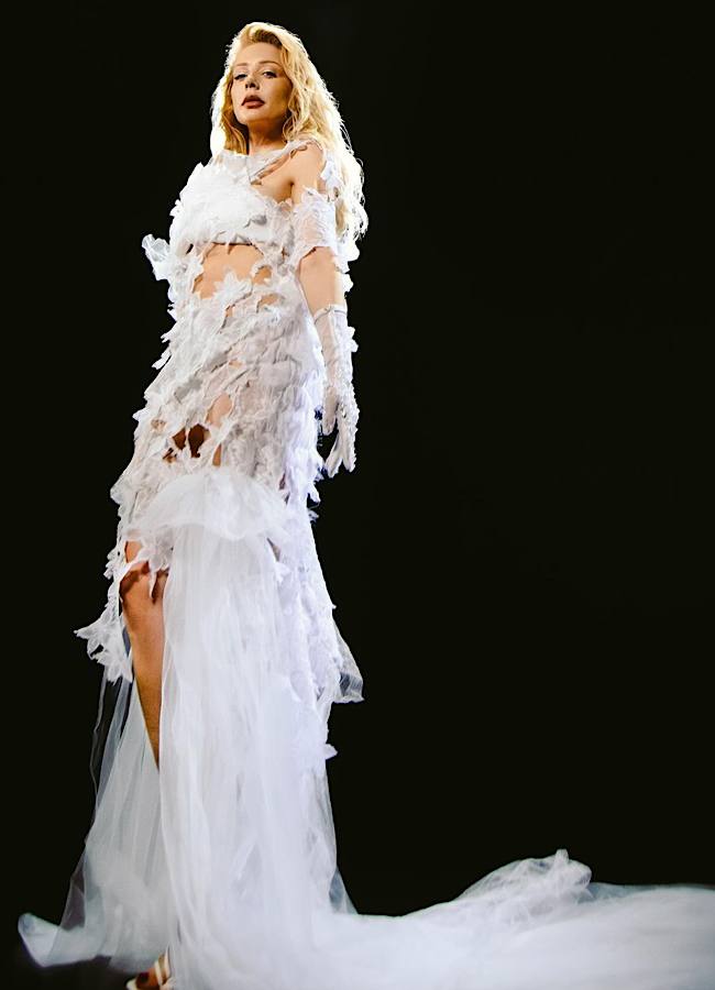 Лосини з мас-маркету та водолазка від Кардаш'ян: Ніколас Карма розсекретив вартість луку Тіни Кароль