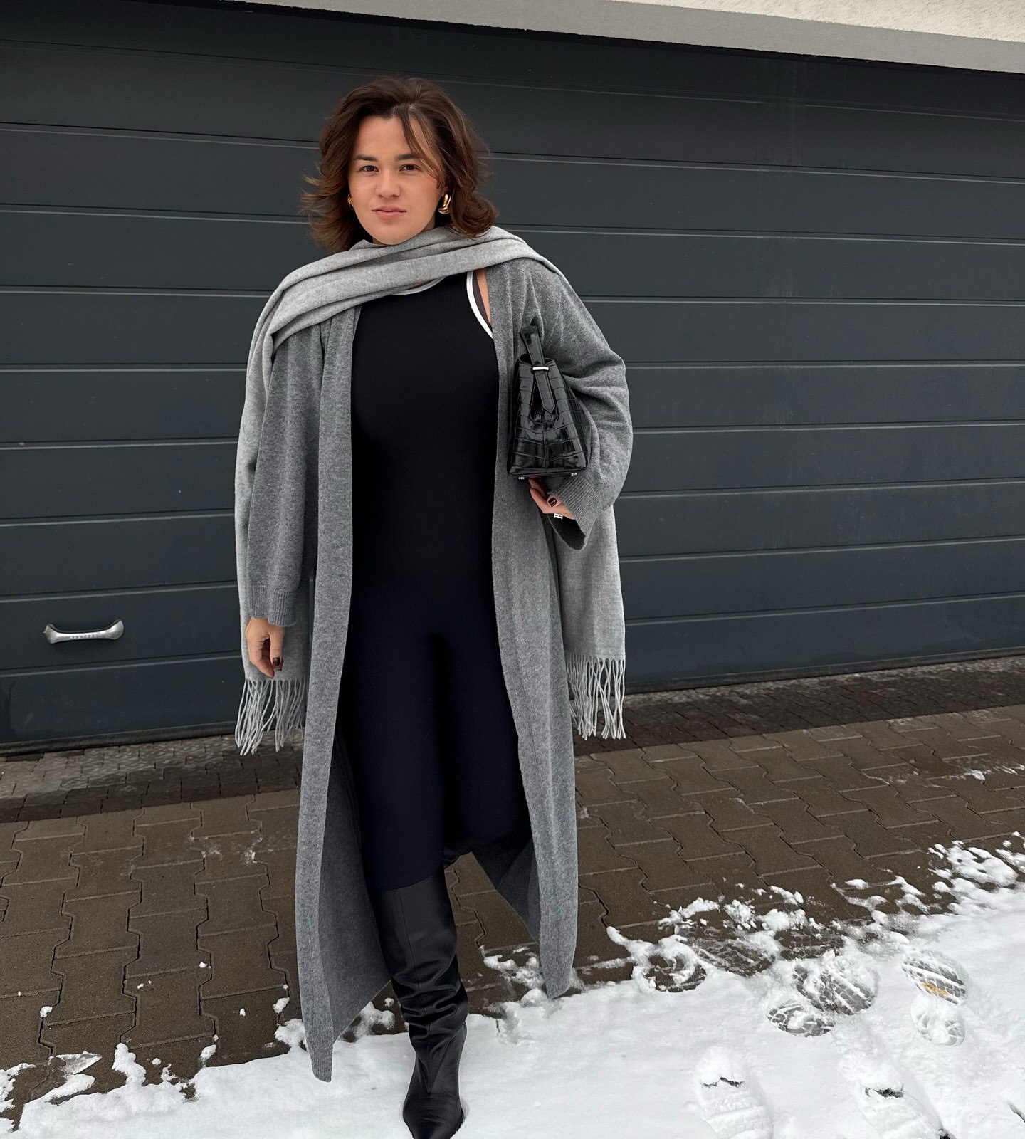 Тепле пальто на зиму: які фасони та тренди обирають Злата Огнєвіч, Христина Горняк та дружина Павліка