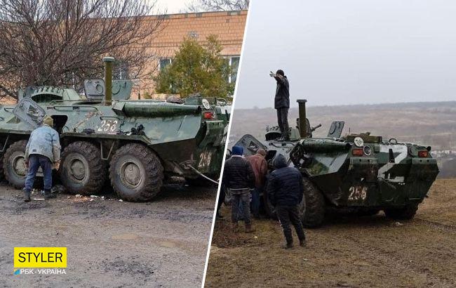 Под Николаевом местные жители захватили вражеский БТР и укатили его на тракторе (фото)