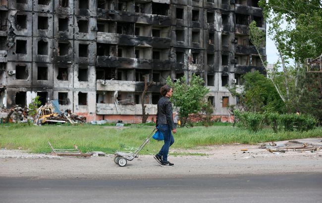 Места захоронений под Мариуполем увеличились вдвое: спутниковые снимки