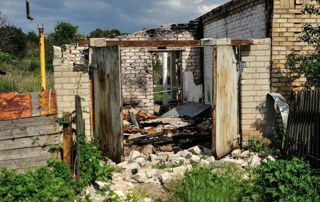 "Боюсь собственного дома": пронзительные фото жизни украинцев в ООС (фото)